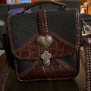 Two Brighton vintage crossbody purses. Both are brown and black leather.